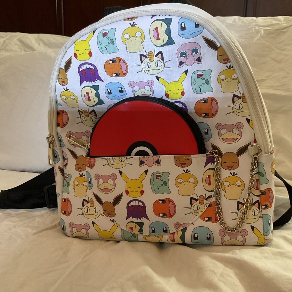Pokemon‎ Pokeball Graphic Mini Backpack, Multi-Color  with chained zipper pouch.